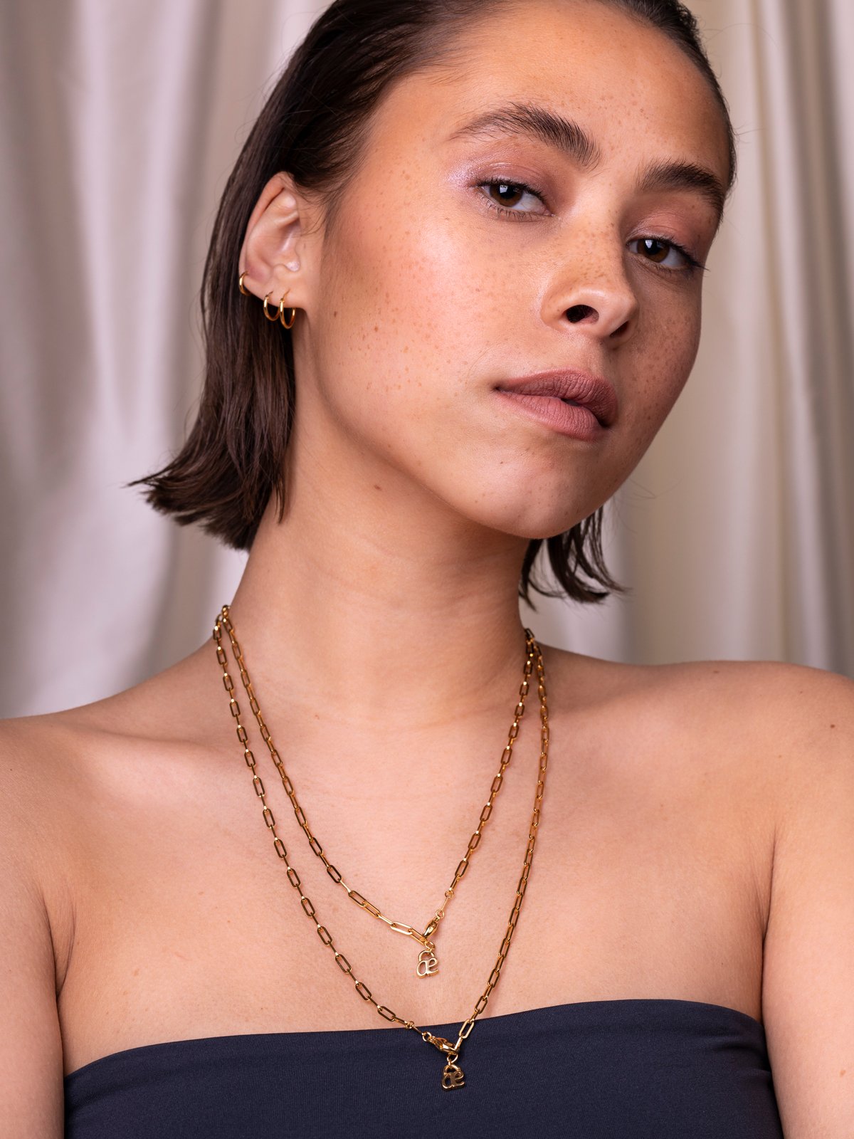 mini creole single 11mm Ø - 18kt GG